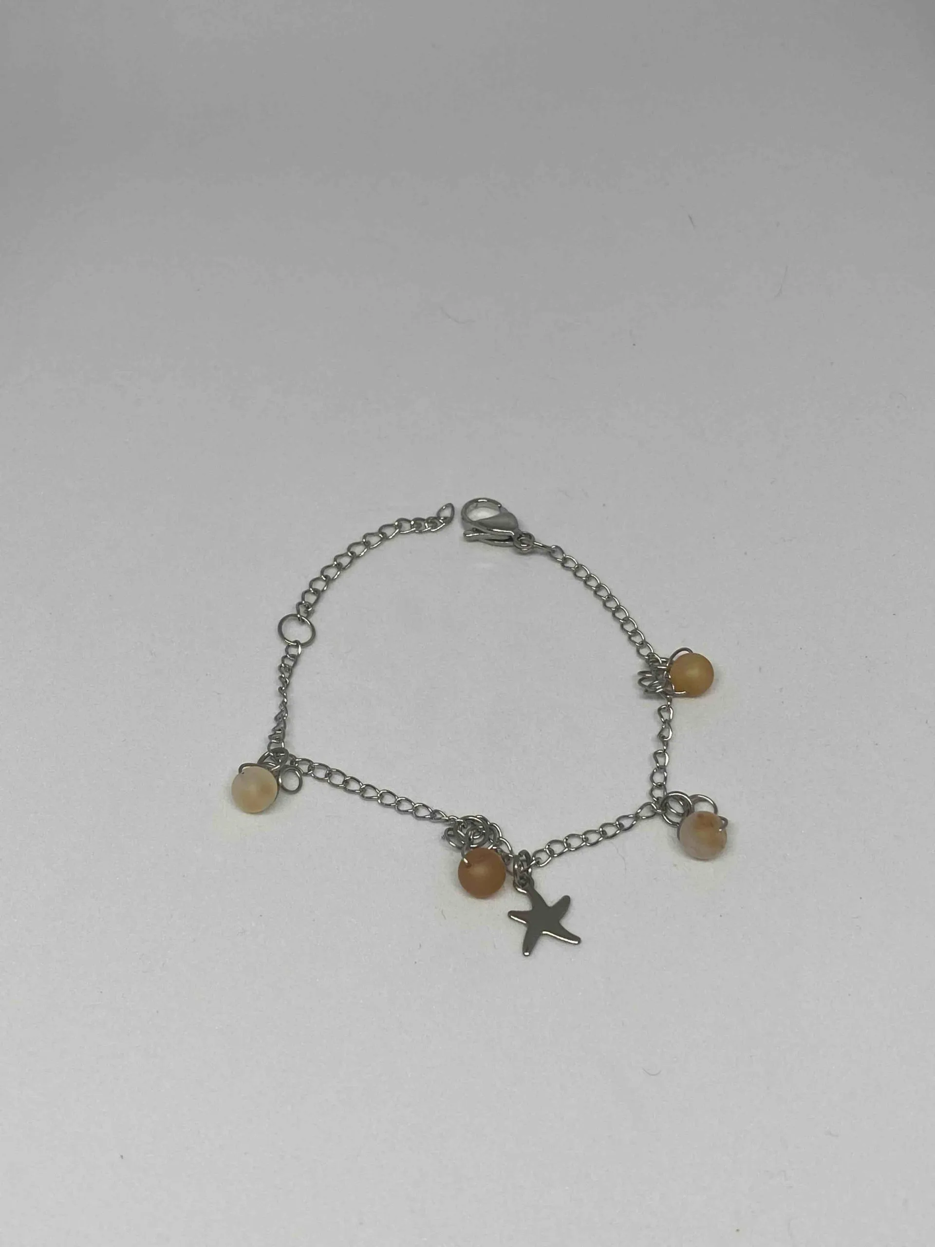 Bracelet en acier inoxydable, breloque étoile et cornaline mat, cornaline